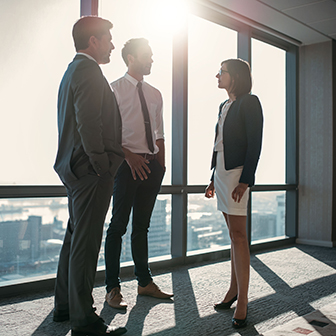 Business people in front of city scape